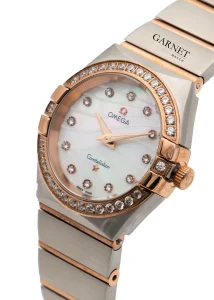 ساعت امگا زنانه کانسلیشن دورنگ رزگلد صفحه موجدار عدد نگین زه نگین Omega Constellation